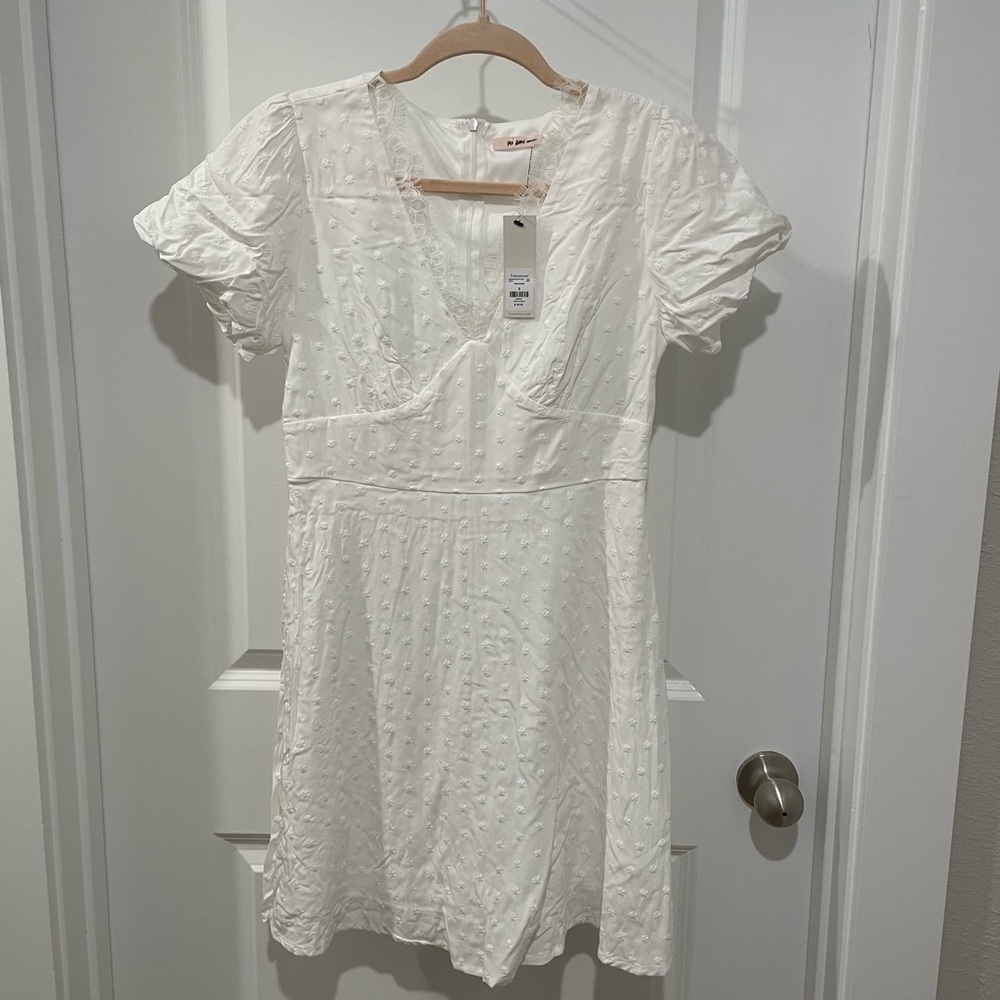 small white dress. never worn with tags on. perfect for bride to be!